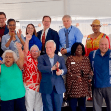 Austin's mayor and others at a ribbon cutting